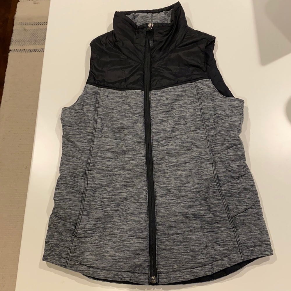 The North Face vest.  Girls size 10/12 medium.